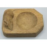 Workshop of Robert 'Mouseman' Thompson of Kilburn: carved oak ashtray with signature mouse, L10.5cm