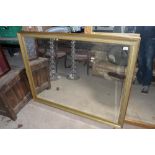 Modern gilt framed bevelled edge mirror in swept frame 133cm X 104cm