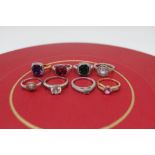 Collection of silver and silver gilt rings including a Silver solitaire ring set with diamonds,