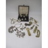 Silver charm bracelet with approx. 17 silver and white metal charms, most stamped Sterling, 800,