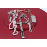 Hallmarked Sterling silver ingot pendant, another silver ingot pendant on silver chain, a silver