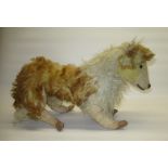 Mid C20th Deans Rag Book collie type dog in white and auburn mohair, with plastic feet, L23cm