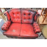 Burgundy leather semi wingback two seater sofa deeply button back W132cm X D77cm X H90cm