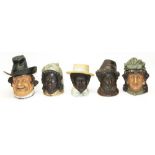 Five late C19th/early C20th novelty figural tobacco jars by Bernard Bloch modelled as human heads: