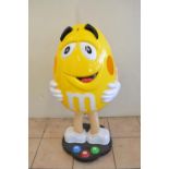 Large plastic M&M character, on wheeled base, H104cm