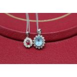 9ct white gold pendant set with blue topaz and diamonds, on 9ct white gold chain and an 18ct white