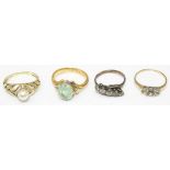 Yellow metal ring set with pale green stone, hallmarks worn, size L1/2, a yellow metal ring set with