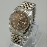 Seiko 5 automatic wristwatch with English - Arabic day and date, signed copper coloured military