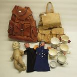 A policeman and a priest hand puppets' and a bisque headed oriental doll made in Germany, collectio