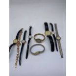 Ladies 18k gold plated wristwatch set with pink stones, and a collection of ladies watches including