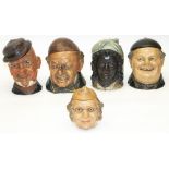 Five late C19th/early C20th novelty figural tobacco jars by Bernard Bloch modelled as human heads: