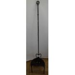 C19th cast and wrought iron D shaped footman, with pad front foot, W33cm D25cm H32cm, and a