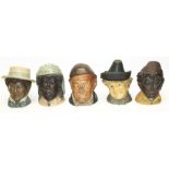 Five late C19th/early C20th novelty figural tobacco jars by Bernard Bloch modelled as human heads: