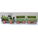 Large homemade child's train model, with two Leon's Express wagons, overall approx L95cm
