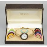 1990's Gucci quartz wristwatch, on matching bracelet with multi coloured interchangeable bezels,