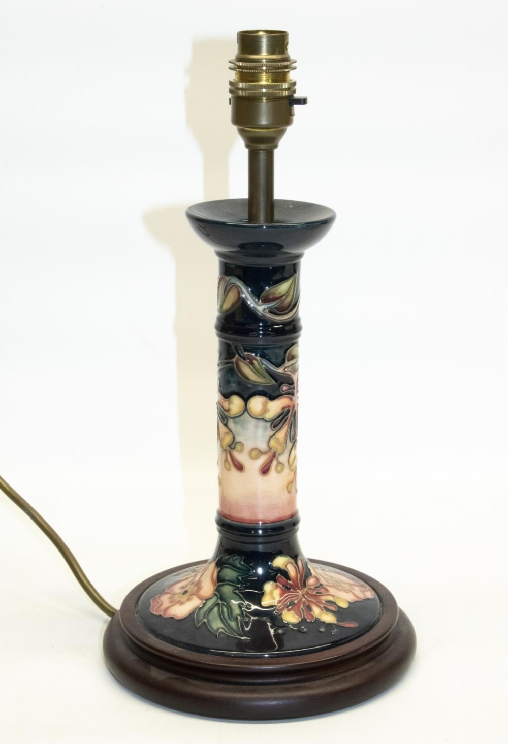 Moorcroft Hibiscus pattern table lamp on turned moulded base, hand painted serial no. to the