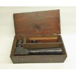 Early C20th 18x50 japanned brass spotting scope, in fitted wooden box complete with stand, overall