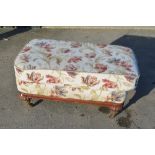 Large Regency style rectangular stool, with loose cushion top, on turned supports with brass sockets