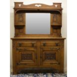 Art Nouveau oak sideboard, in the style of Shapland & Petter, mirror back with pierced cresting, the