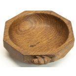 Colin "Beaverman" Almack - a faceted oak octagonal bowl, carved with signature beaver, D14.5cm