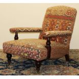 George Smith Victorian style Kelim upholstered open arm chair, on turned supports with brass sockets