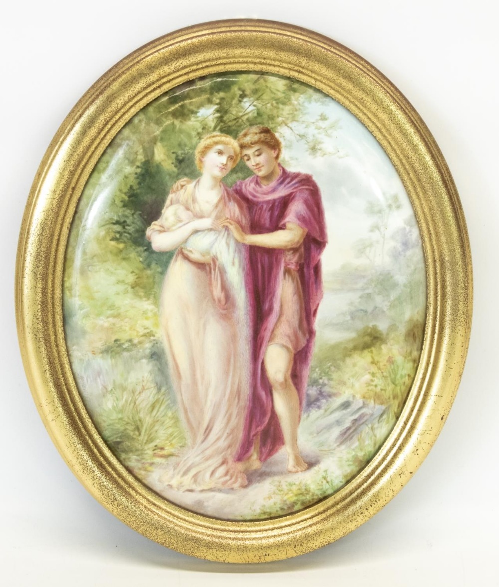 Continental oval porcelain plaque painted with lovers in a garden landscape, H28cm