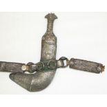 Omani Saidi Khanjar dagger/ornamental scabbard with sharply curved blade, white metal ornate