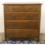 C20th oak chest, overhanging top above two short and three long drawers with angular brass handles