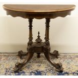 Victorian burr walnut card table, baize lined moulded folding oval top on four turned column