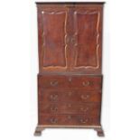 George III parcel gilt mahogany estate secretaire cabinet, moulded cornice above two fielded panel