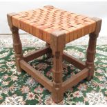 Sid Pollard of Thirsk - oak rectangular stool, plaited leather top on octagonal baluster supports,