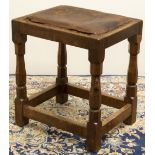 Robert "Mouseman" Thompson of Kilburn - oak rectangular stool, brass nail leather upholstered top on