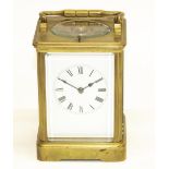 Early C20th French brass cased carriage clock, Gorge case with bevelled edged panels, twin train