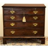 Small George III mahogany dressing chest, crossbanded moulded top with brushing slide and four
