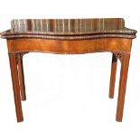 George III serpentine mahogany folding tea table with rosette carved edge, single gate action on