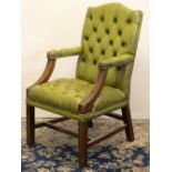 George III style library chair, arched back with down scrolled moulded arms and legs joined by