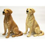 Two large Beswick fire side models of seated yellow and red Labradors, both No. 2314, impressed