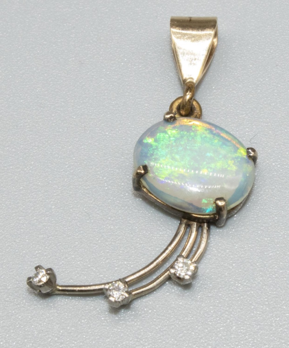 9ct yellow gold opal and diamond pendant, the cabochon opal above three brilliant cut diamonds,