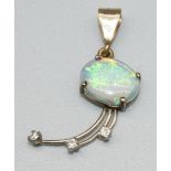 9ct yellow gold opal and diamond pendant, the cabochon opal above three brilliant cut diamonds,