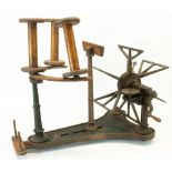 James Heal & Co Halifax, a brass and cast iron yarn winder, on shaped base with three wooden