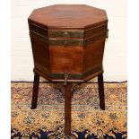 George III brass bound mahogany octagonal wine cooler, with divided interior, brass tap and handles,
