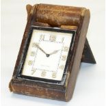 Jaeger-LeCoultre chromed metal travel clock, with signed rectangular cream Arabic dial, eight day