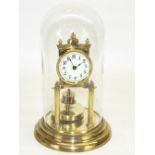 Early C20th continental brass suspension clock, Arabic dial with outer minute track, on circular