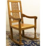 Robert "Mouseman" Thompson of Kilburn - an oak rocking chair with twin lattice panel back and