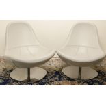 Pair of Ikea Retro Tirup white leather upholstered swivel chairs on chromed metal bases, W76cm H76cm