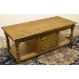 Stewart Linford Furniture - an oak two tier rectangular coffee table, moulded burr top above two