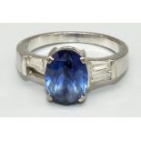 WITHDRAWN - 18ct white gold sapphire and diamond ring, the central oval cut sapphire (Un-heated,