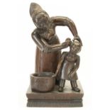 C20th carved oak Pears Soap advertising model, titled 'You Dirty Boy' on rectangular base, H37cm