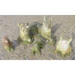 Five reconstituted stone dog garden ornaments, 3 Spaniels, an Alsatian and another