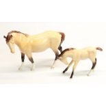Two Beswick dun coloured horses, BCC 1997, mare, H16.5cm, and a foal, H11cm